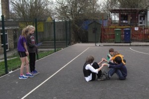 Children at Coton Primary School leading a game of 'All Aboard'